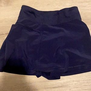 Short blue with a pocket in the front